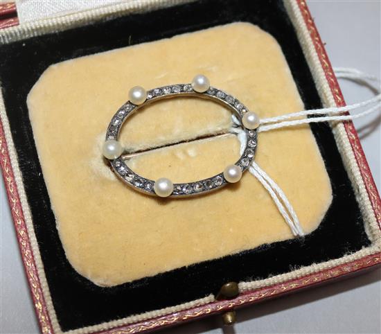 An early 20th century gold and silver, rose cut diamond and cultured pearl set open circular brooch, width 33mm.